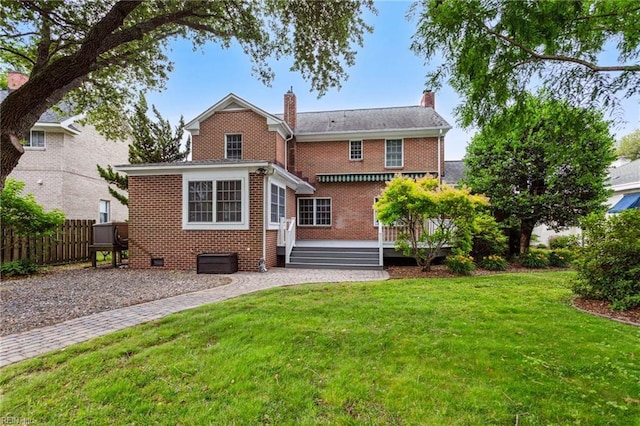 3403 Chesapeake Ave, Hampton, VA 23661 - back of property featuring brick siding, a chimney, and a wooden deck
