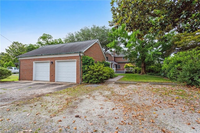 3403 Chesapeake Ave, Hampton, VA 23661 - view of side of home featuring a detached garage and brick siding