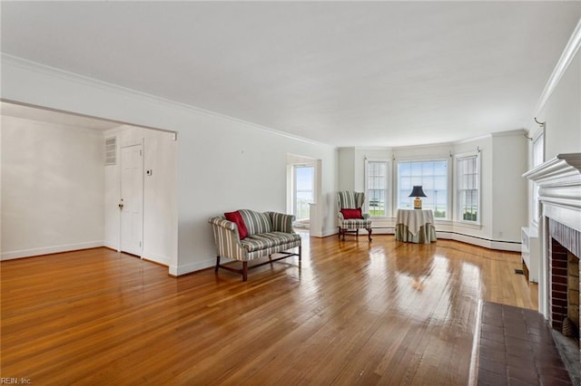 3403 Chesapeake Ave, Hampton, VA 23661 - living area featuring ornamental molding, a fireplace, hardwood / wood-style floors, and baseboards