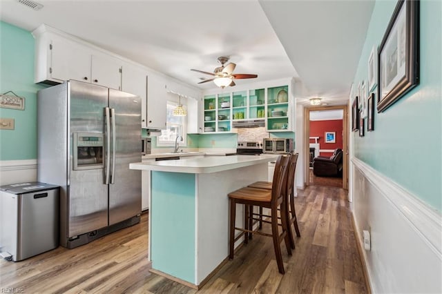 107 Benson Dr, Hampton, VA 23664 - kitchen featuring stainless steel appliances, light wood-style flooring, white cabinets, and a sink
