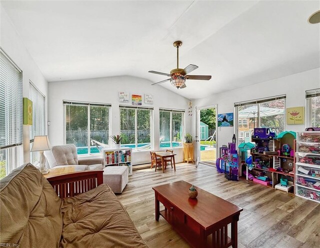 107 Benson Dr, Hampton, VA 23664 - living area featuring a ceiling fan, healthy amount of natural light, light wood-style flooring, and vaulted ceiling
