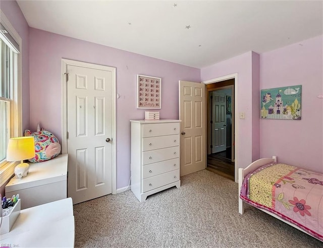 107 Benson Dr, Hampton, VA 23664 - bedroom featuring light colored carpet and baseboards