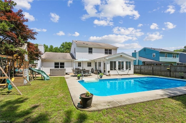 107 Benson Dr, Hampton, VA 23664 - rear view of house featuring a patio area and a playground