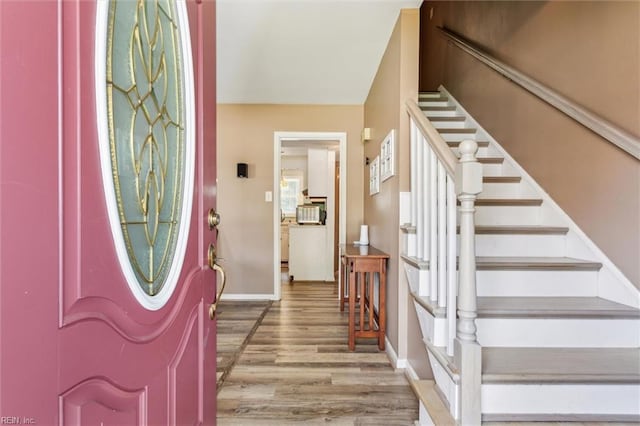 107 Benson Dr, Hampton, VA 23664 - entrance foyer featuring wood finished floors, baseboards, and stairs