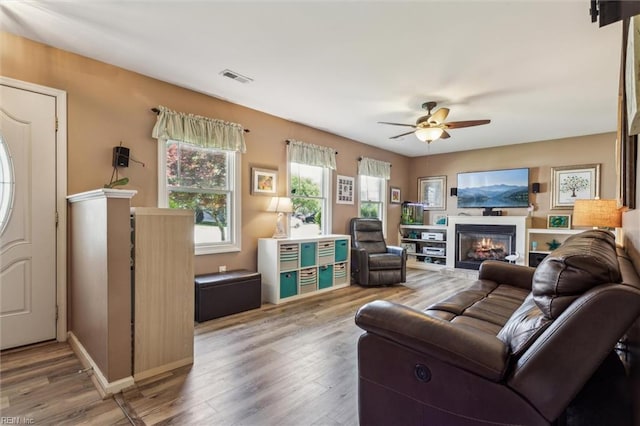 107 Benson Dr, Hampton, VA 23664 - living room with healthy amount of natural light, a ceiling fan, and wood finished floors