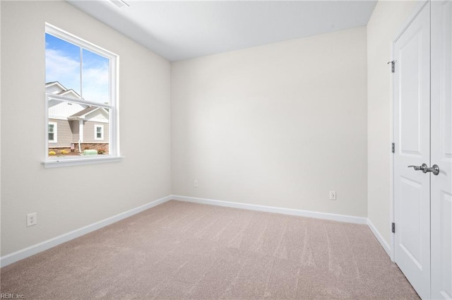 2300 Venture Way Unit B, Suffolk, VA 23434 - unfurnished bedroom featuring carpet floors, baseboards, and a closet