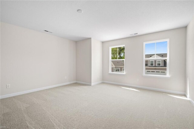 2300 Venture Way Unit B, Suffolk, VA 23434 - spare room featuring baseboards and carpet flooring