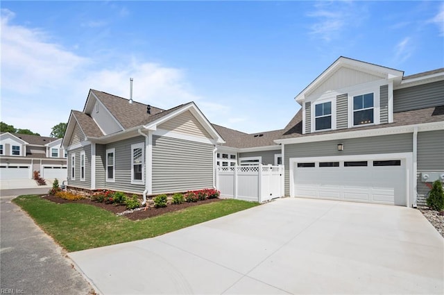 2300 Venture Way Unit B, Suffolk, VA 23434 - view of front of property featuring concrete driveway, an attached garage, and roof with shingles