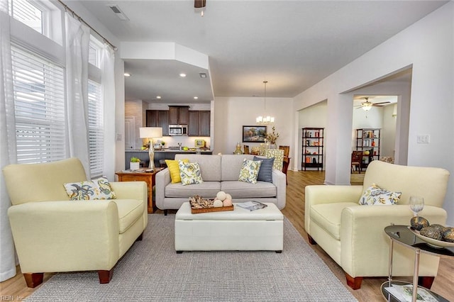 2300 Venture Way Unit B, Suffolk, VA 23434 - living area with wood finished floors, a chandelier, a ceiling fan, and recessed lighting