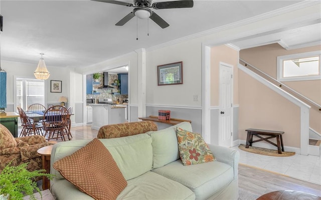 4201 Newport Ave, Norfolk, VA 23508 - living area featuring plenty of natural light, a ceiling fan, crown molding, baseboards, and stairway