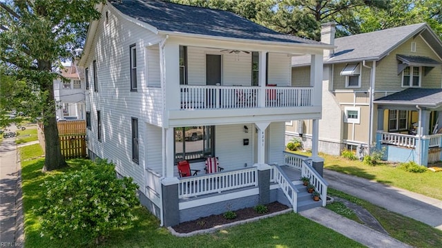 4201 Newport Ave, Norfolk, VA 23508 - view of front of home featuring covered porch, a balcony, and a front yard