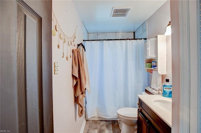 3521 Wayne St, Virginia Beach, VA 23452 - bathroom featuring vanity, toilet, and shower / bath combination with curtain