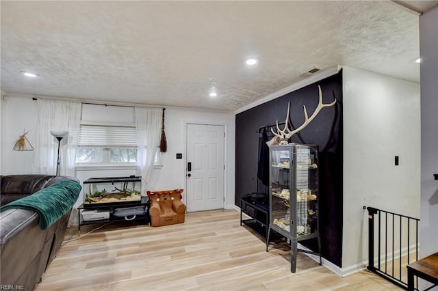 3521 Wayne St, Virginia Beach, VA 23452 - entrance foyer featuring wood finished floors, recessed lighting, a textured ceiling, and baseboards