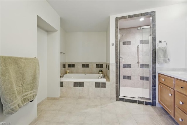 4250 Granby St Unit 109, Norfolk, VA 23504 - full bath featuring a garden tub, a stall shower, vanity, and tile patterned flooring
