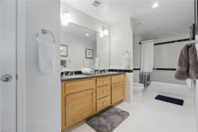 4250 Granby St Unit 109, Norfolk, VA 23504 - bathroom featuring double vanity, toilet, recessed lighting, and shower / tub combo with curtain