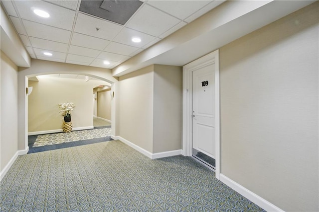 4250 Granby St Unit 109, Norfolk, VA 23504 - hall with arched walkways, baseboards, a paneled ceiling, carpet, and recessed lighting