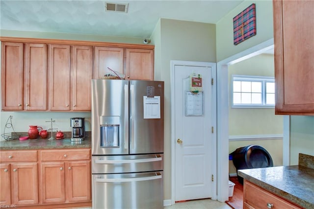 1757 Brigands Way, Virginia Beach, VA 23453 - kitchen featuring stainless steel refrigerator with ice dispenser, dark countertops, and brown cabinets
