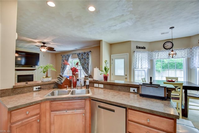 1757 Brigands Way, Virginia Beach, VA 23453 - kitchen with stainless steel dishwasher, a sink, open floor plan, ceiling fan, and hanging light fixtures