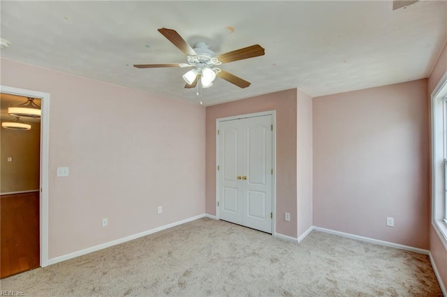 1757 Brigands Way, Virginia Beach, VA 23453 - unfurnished bedroom with carpet flooring, baseboards, a closet, and a ceiling fan