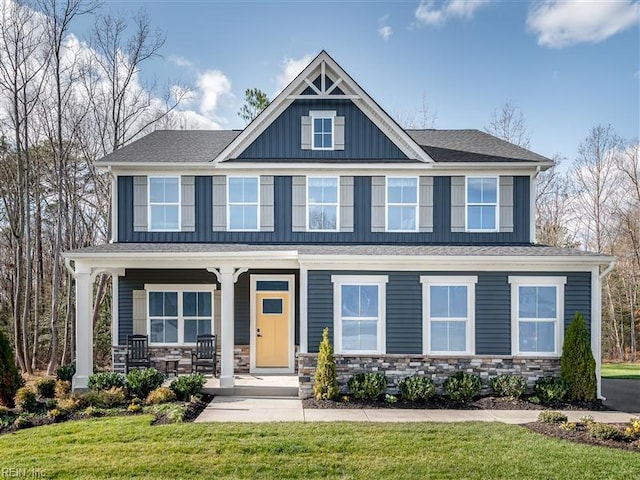 1500 Charlie St, Chesapeake, VA 23322 - craftsman inspired home with board and batten siding, a porch, stone siding, and a front yard