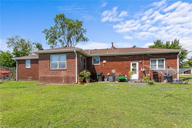 1232 Typo Ave, Norfolk, VA 23502 - rear view of house featuring brick siding and central AC