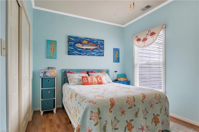 1026 High Dunes Quay Quay Unit 201, Hampton, VA 23664 - bedroom featuring wood finished floors, crown molding, and baseboards