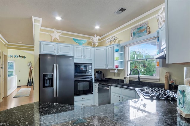 1026 High Dunes Quay Quay Unit 201, Hampton, VA 23664 - kitchen with black appliances, ornamental molding, a sink, dark stone countertops, and recessed lighting