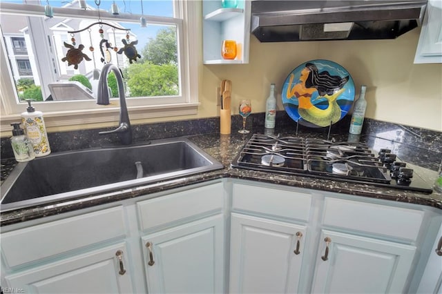 1026 High Dunes Quay Quay Unit 201, Hampton, VA 23664 - kitchen with premium range hood, black gas cooktop, a sink, white cabinets, and dark stone counters