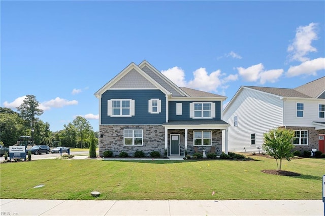 3031 Dalton Cir, Suffolk, VA 23435 - craftsman-style house with stone siding and a front yard