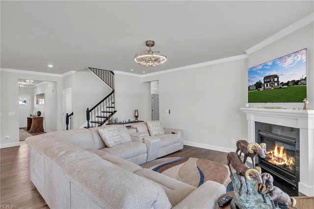 3001 Brylie Ct, Suffolk, VA 23435 - living area with stairway, a glass covered fireplace, wood finished floors, ornamental molding, and baseboards