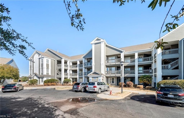 1031 High Dunes Quay Quay Unit 103, Hampton, VA 23664 - view of apartment building / complex with uncovered parking