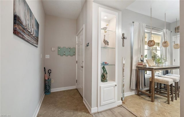 1031 High Dunes Quay Quay Unit 103, Hampton, VA 23664 - corridor featuring baseboards
