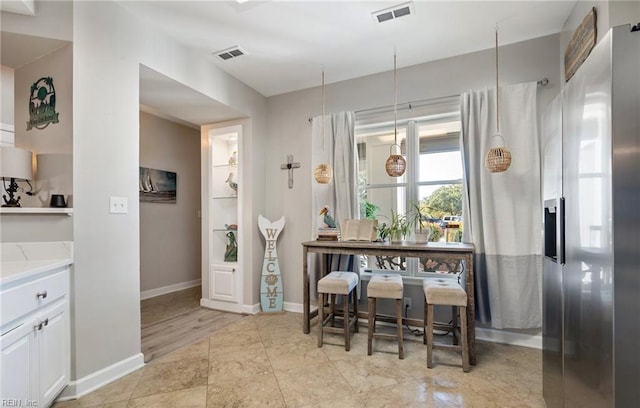 1031 High Dunes Quay Quay Unit 103, Hampton, VA 23664 - dining space featuring baseboards