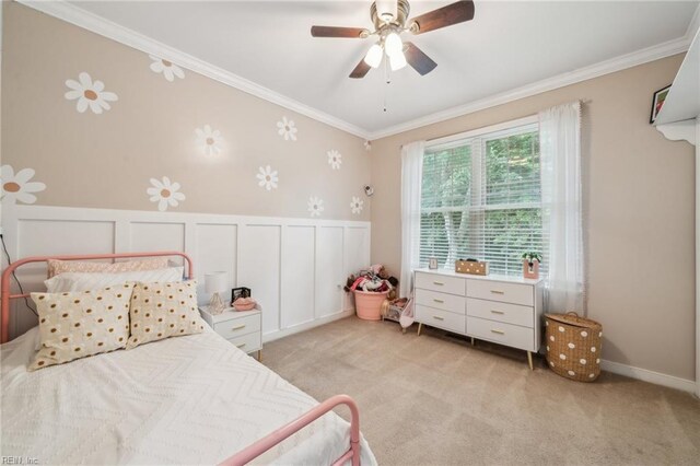 183 Belle Aire Dr, Hardyville, VA 23070 - bedroom featuring crown molding, light carpet, a wainscoted wall, ceiling fan, and a decorative wall