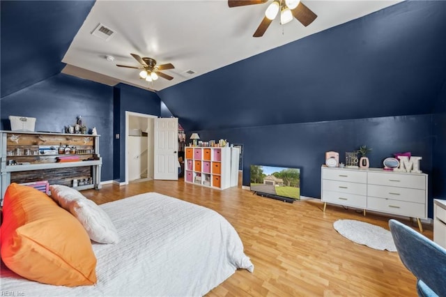 183 Belle Aire Dr, Hardyville, VA 23070 - bedroom featuring vaulted ceiling, wood finished floors, and ceiling fan