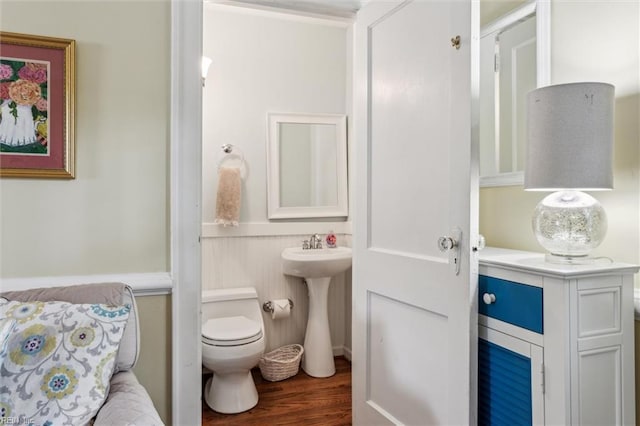 28 Shirley Rd, Newport News, VA 23601 - bathroom featuring toilet, wood finished floors, and a sink