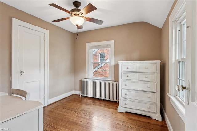 28 Shirley Rd, Newport News, VA 23601 - bedroom featuring radiator, wood finished floors, baseboards, vaulted ceiling, and ceiling fan
