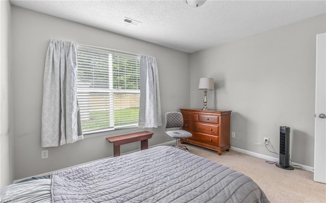 403 Joel Ct, Newport News, VA 23608 - carpeted bedroom with a textured ceiling and baseboards
