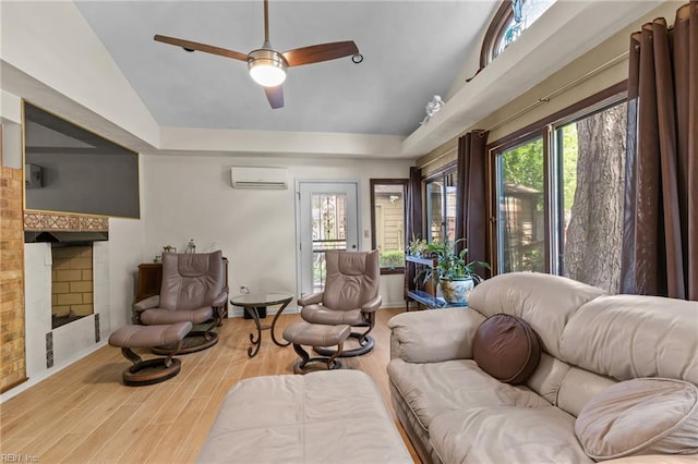 224 Iroquois Rd, Virginia Beach, VA 23462 - living area with vaulted ceiling, a wall unit AC, wood finished floors, ceiling fan, and a fireplace