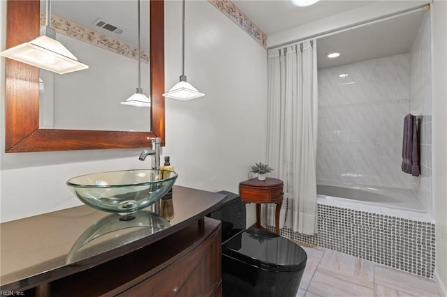 224 Iroquois Rd, Virginia Beach, VA 23462 - bathroom featuring vanity, tiled shower / bath, tile patterned floors, and recessed lighting