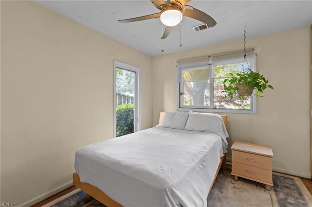224 Iroquois Rd, Virginia Beach, VA 23462 - bedroom featuring baseboards, light wood-style floors, and a ceiling fan