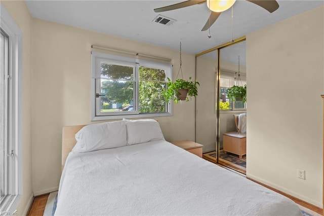 224 Iroquois Rd, Virginia Beach, VA 23462 - bedroom featuring multiple windows, baseboards, a closet, and a ceiling fan