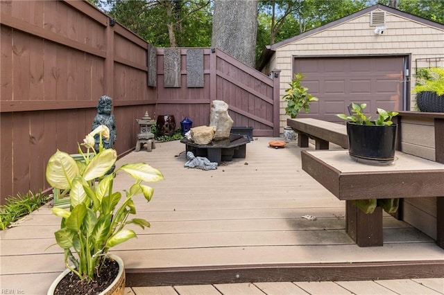 224 Iroquois Rd, Virginia Beach, VA 23462 - wooden deck with an outdoor structure and a detached garage