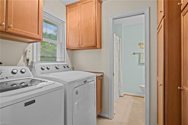 4680 Miles Standish Rd, Virginia Beach, VA 23455 - washroom with cabinet space, separate washer and dryer, light tile patterned floors, and baseboards