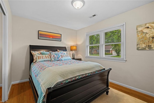 4680 Miles Standish Rd, Virginia Beach, VA 23455 - bedroom with baseboards and wood finished floors