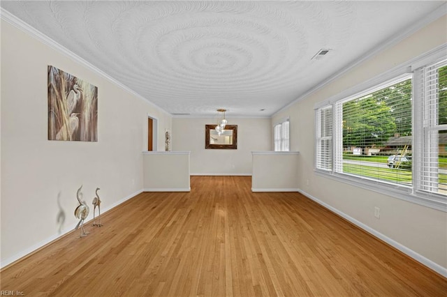 4680 Miles Standish Rd, Virginia Beach, VA 23455 - unfurnished living room featuring ornamental molding, light wood-type flooring, baseboards, and a chandelier