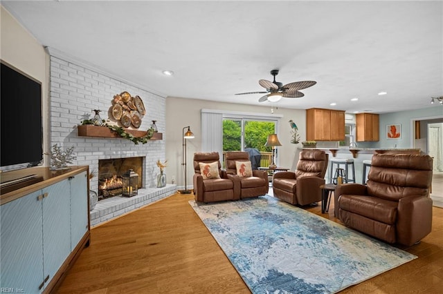 4680 Miles Standish Rd, Virginia Beach, VA 23455 - living room featuring a fireplace, ceiling fan, wood finished floors, and recessed lighting