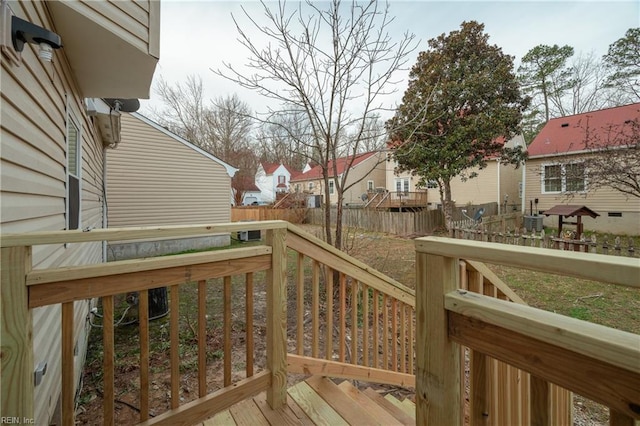 926 Pheasant Run, Williamsburg, VA 23188 - wooden deck with a fenced backyard, a residential view, and central AC