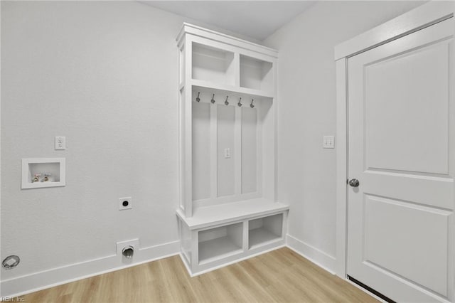 1064 Tulls Creek Rd, Moyock, NC 27958 - mudroom with light wood finished floors and baseboards