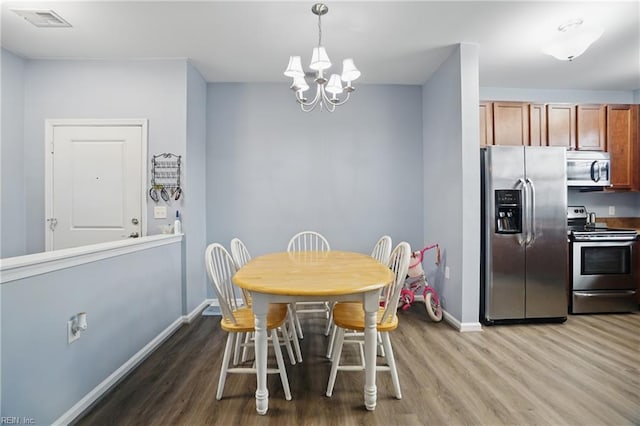 4316 Colindale Rd Unit 106, Chesapeake, VA 23321 - dining space featuring light wood-style floors, baseboards, and a chandelier